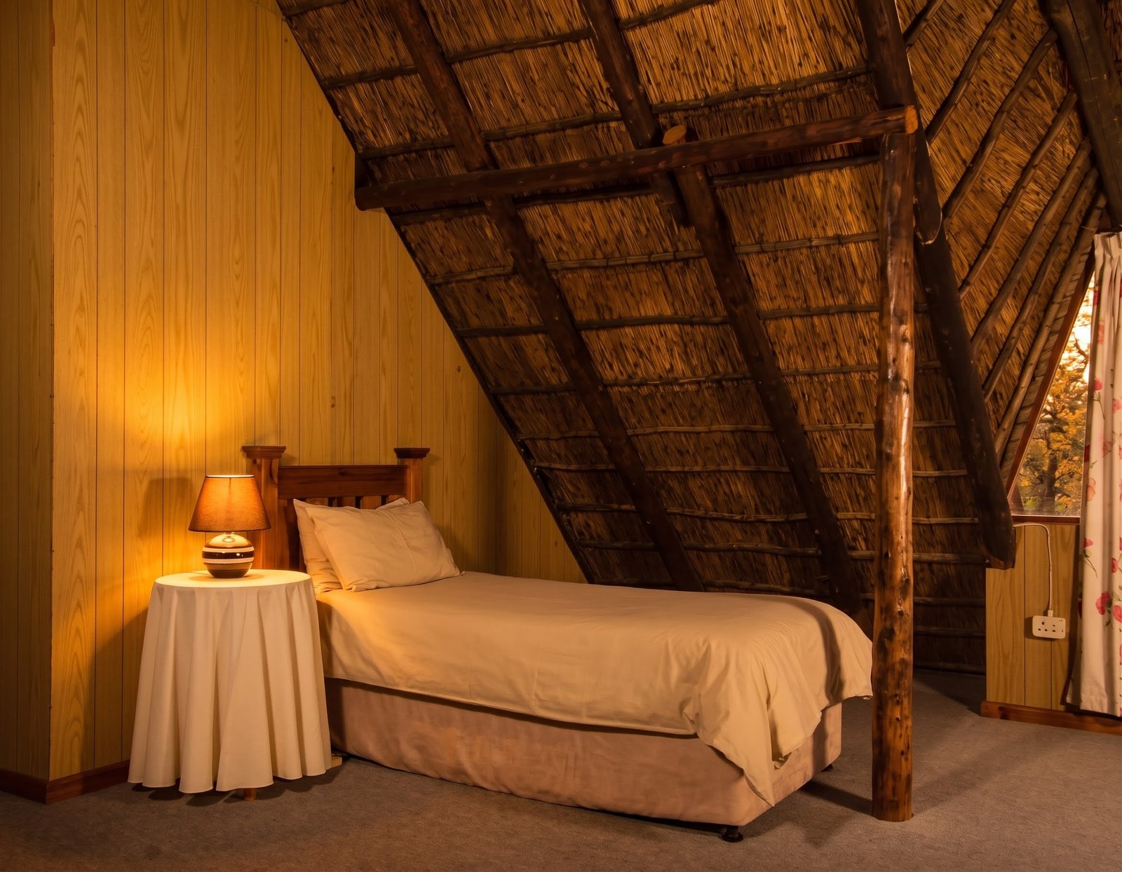 One of the single beds in the upstairs family room at Heron House