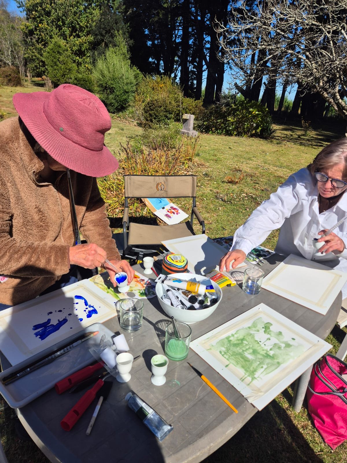 Watercolours and brushes set up for a painting session