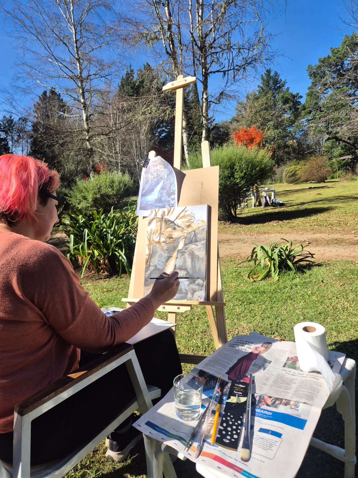 Working from a waterfall reference photo at the easel